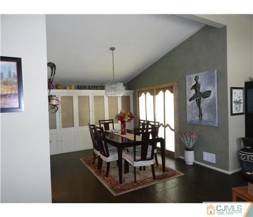 28 Bodnarik Road Edison, NJ 08837 - Photo 5 of 7 a view of a dining room with furniture and window