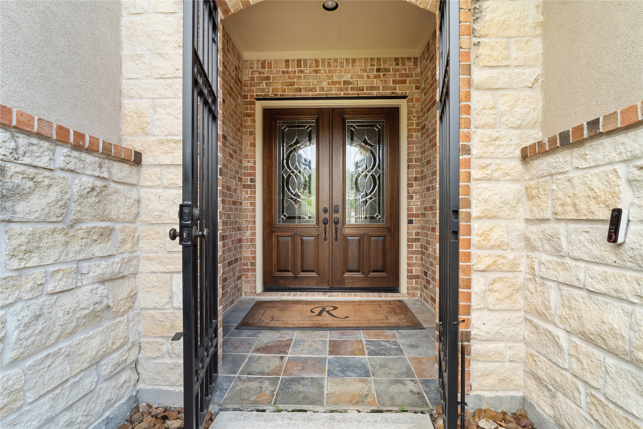 19813 Cullen Ridge Drive Porter, TX 77365 - Photo 5 of 44 Covered entry with the added feature of a gate.