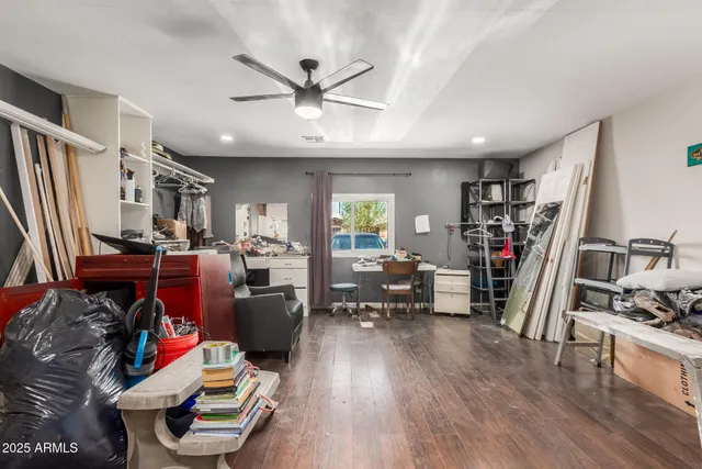 a white toilet sitting next to a bathroom sink