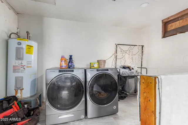 a backyard of a house with outdoor seating