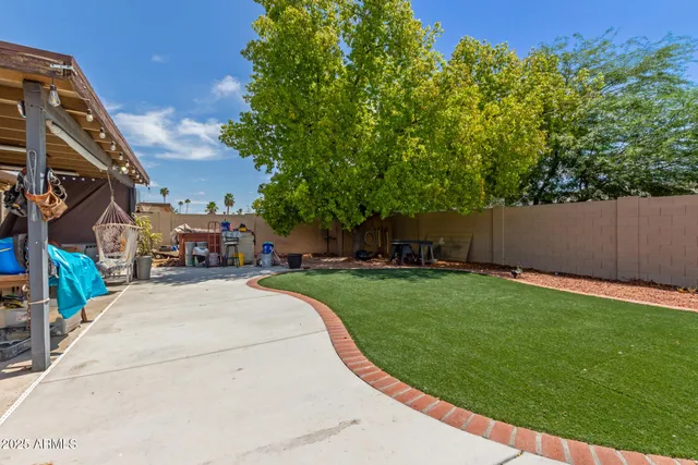 a view of a back yard of the house