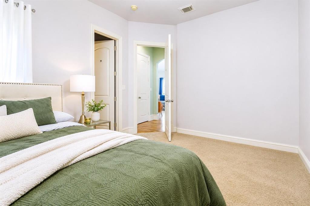 123 Ranch House Road Rockwall, TX 75032 - Photo 17 of 32 Bedroom w/ ensuite bathroom