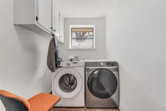 a utility room with dryer and washer