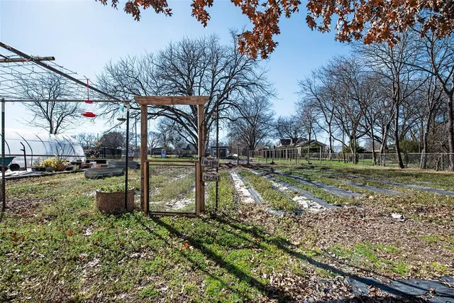 a backyard of a house with lots of green space