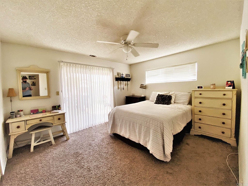 1121 Gardena Road Encinitas, CA 92024 - Photo 9 of 15 a bedroom with a bed and a cabinets