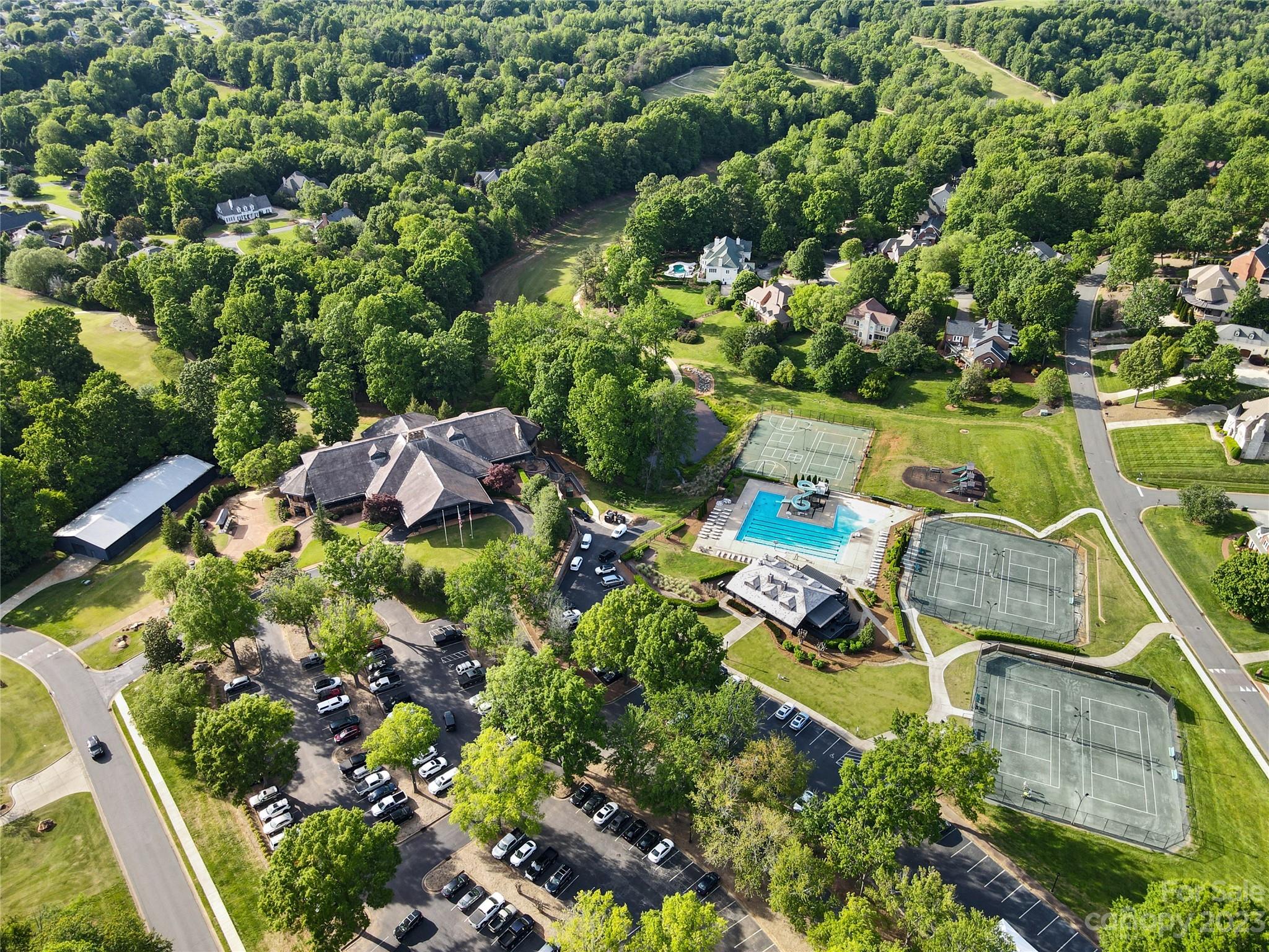 2909 Dodsworth Drive Cramerton, NC 28032 - Photo 5 of 9 an aerial view of house with yard swimming pool and outdoor seating