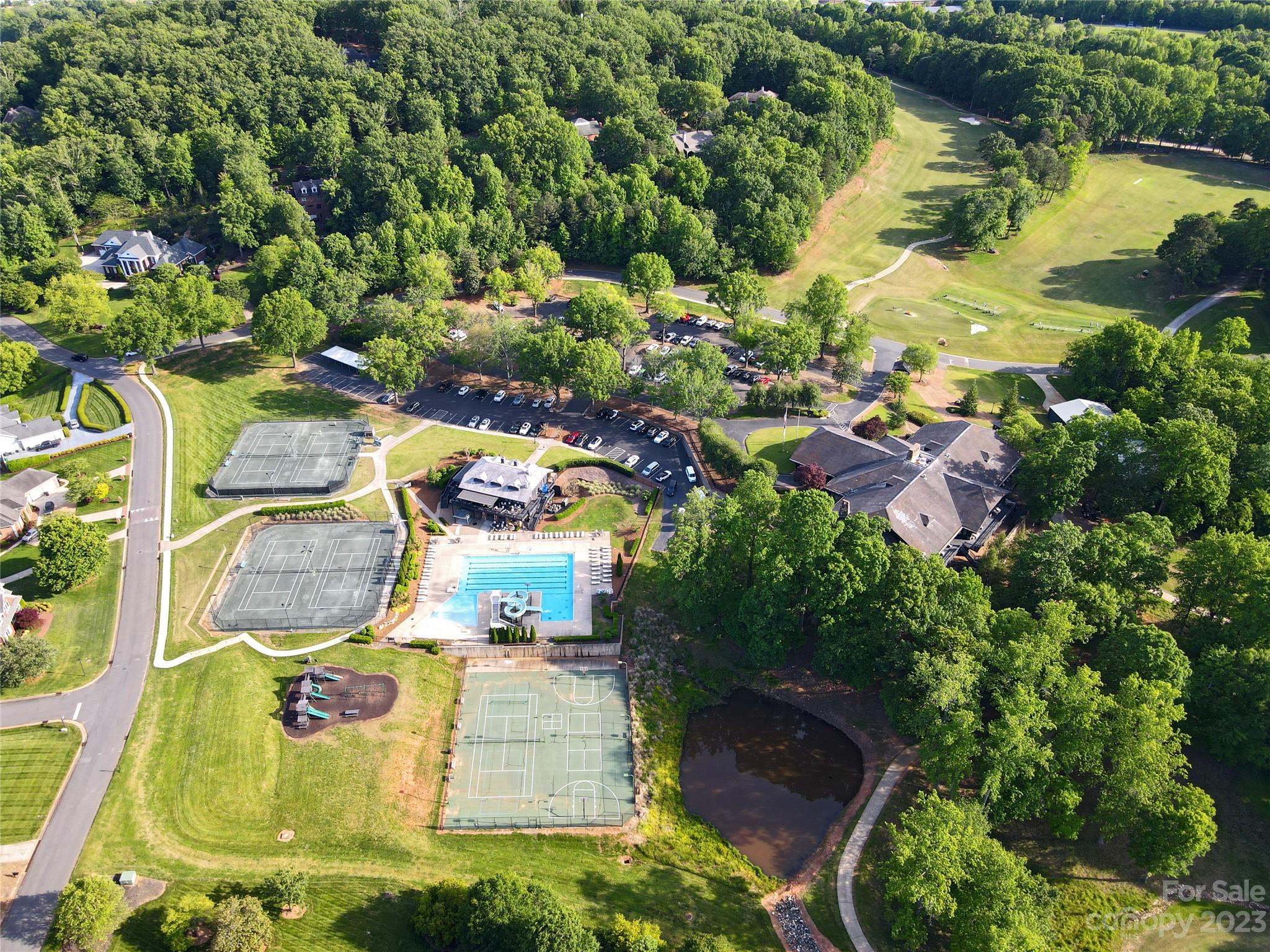 2909 Dodsworth Drive Cramerton, NC 28032 - Photo 6 of 9 an aerial view of residential houses with outdoor space