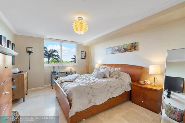 a bedroom with a bed and a table in it