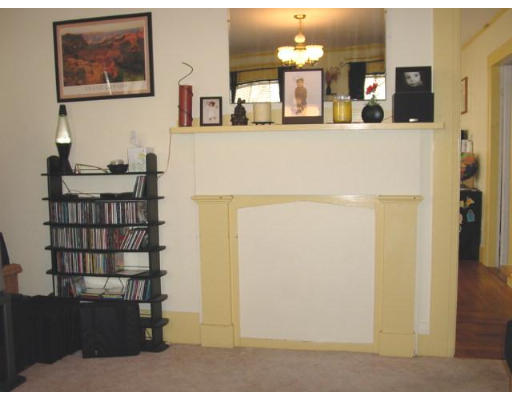 118 Elm Street Amesbury, MA 01913 - Photo 3 of 4 a view of a kitchen from the hallway