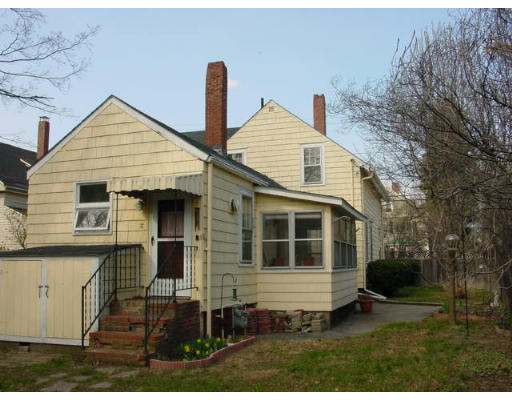118 Elm Street Amesbury, MA 01913 - Photo 4 of 4 a view of a house with a yard