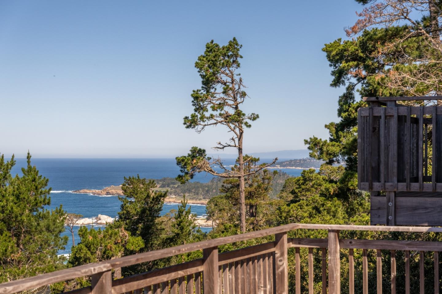 214 Crest Road Carmel, CA 93923 - Photo 3 of 29 a view of a balcony with wooden fence