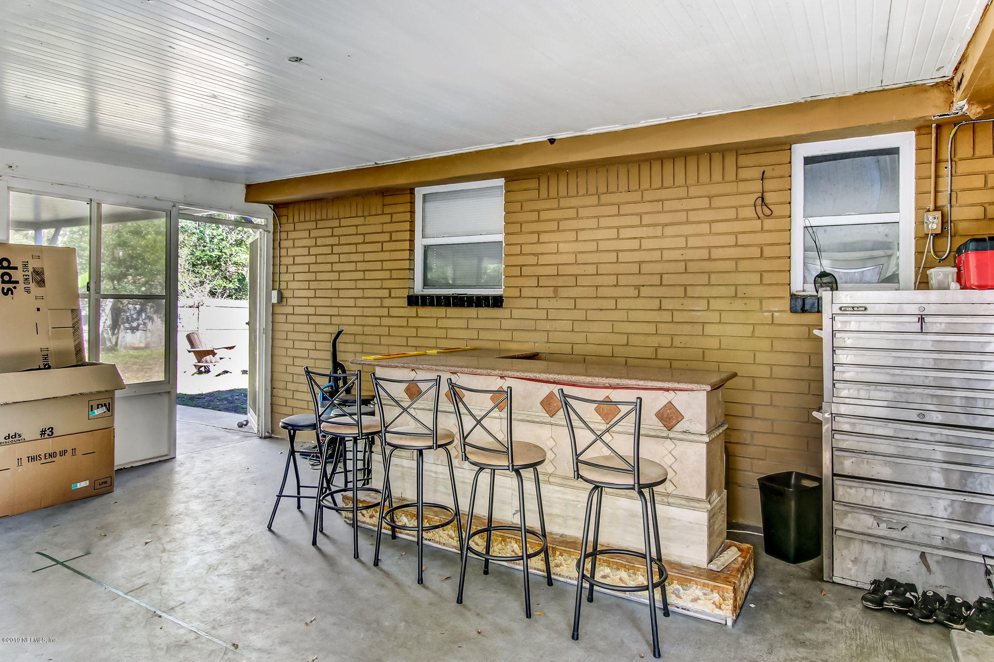 10321 Dobell Road Jacksonville, FL 32246 - Photo 28 of 34 a view of an outdoor space with seating area