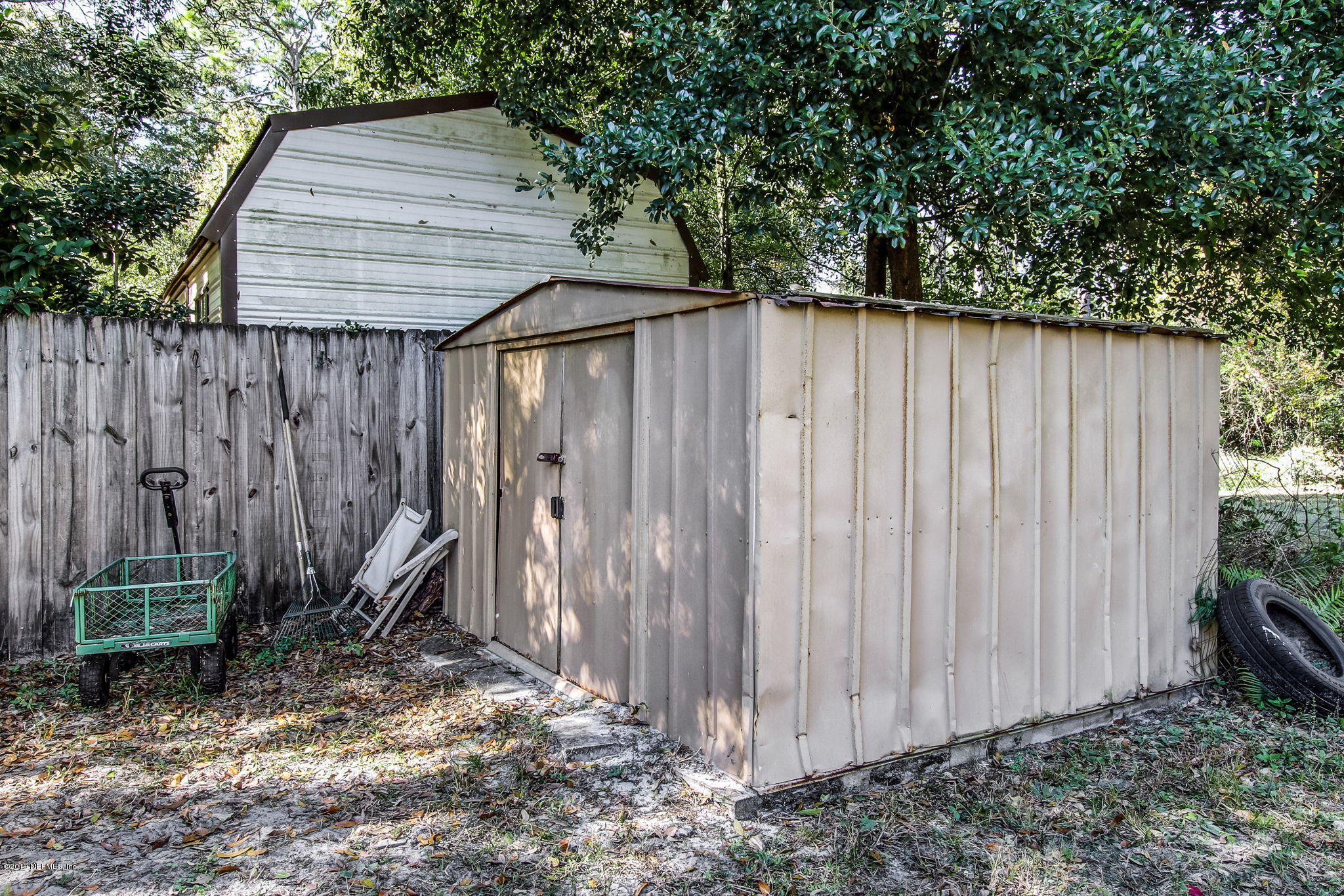 10321 Dobell Road Jacksonville, FL 32246 - Photo 31 of 34 a backyard of a house