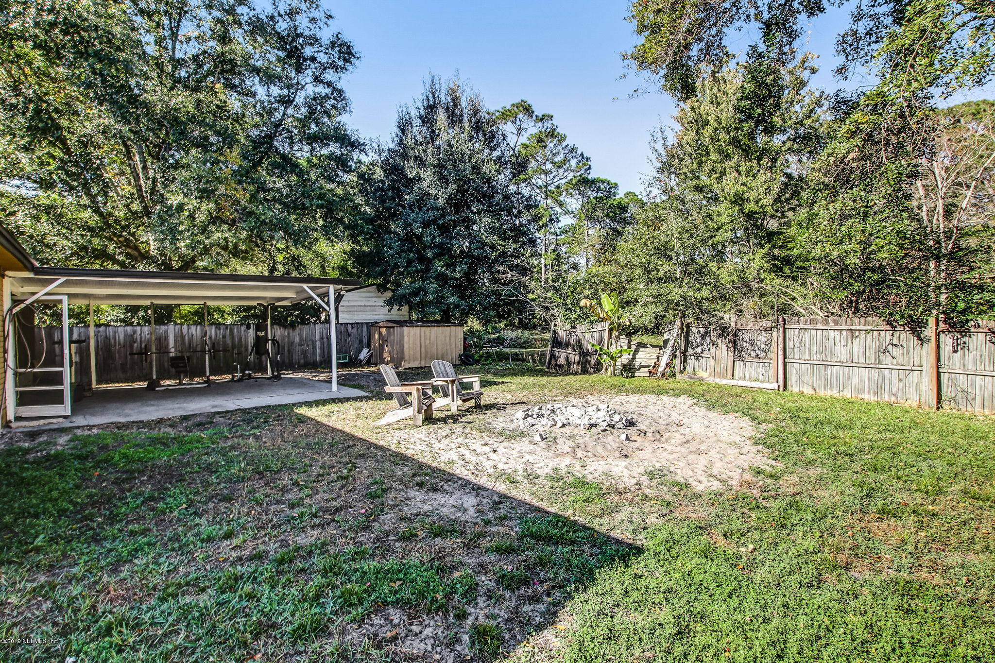 10321 Dobell Road Jacksonville, FL 32246 - Photo 34 of 34 a view of a garden with patio