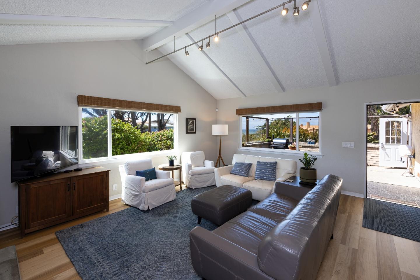 157 Oceanview Drive Watsonville, CA 95076 - Photo 4 of 25 a living room with furniture and a flat screen tv