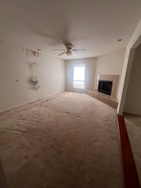 6304 South Rice Avenue Bellaire, TX 77401 - Photo 12 of 16 a view of empty room with a fireplace
