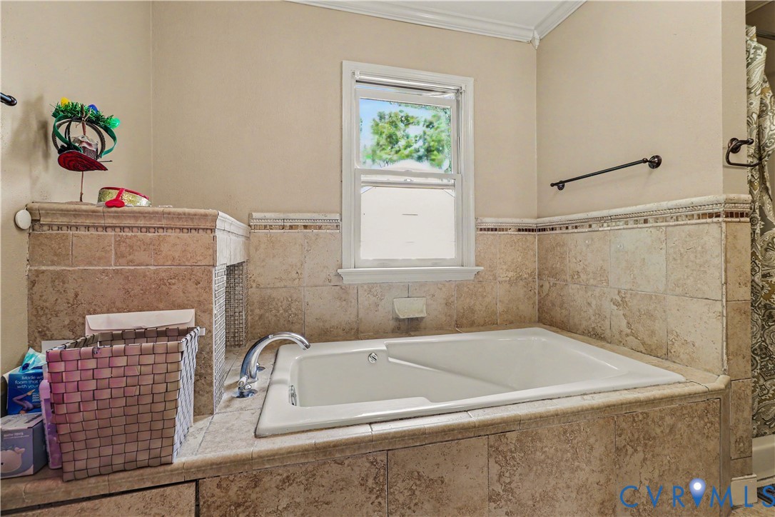 4803 Coleman Road Richmond, VA 23230 - Photo 21 of 54 Built-in soaking tub with a tiled surround, chrome