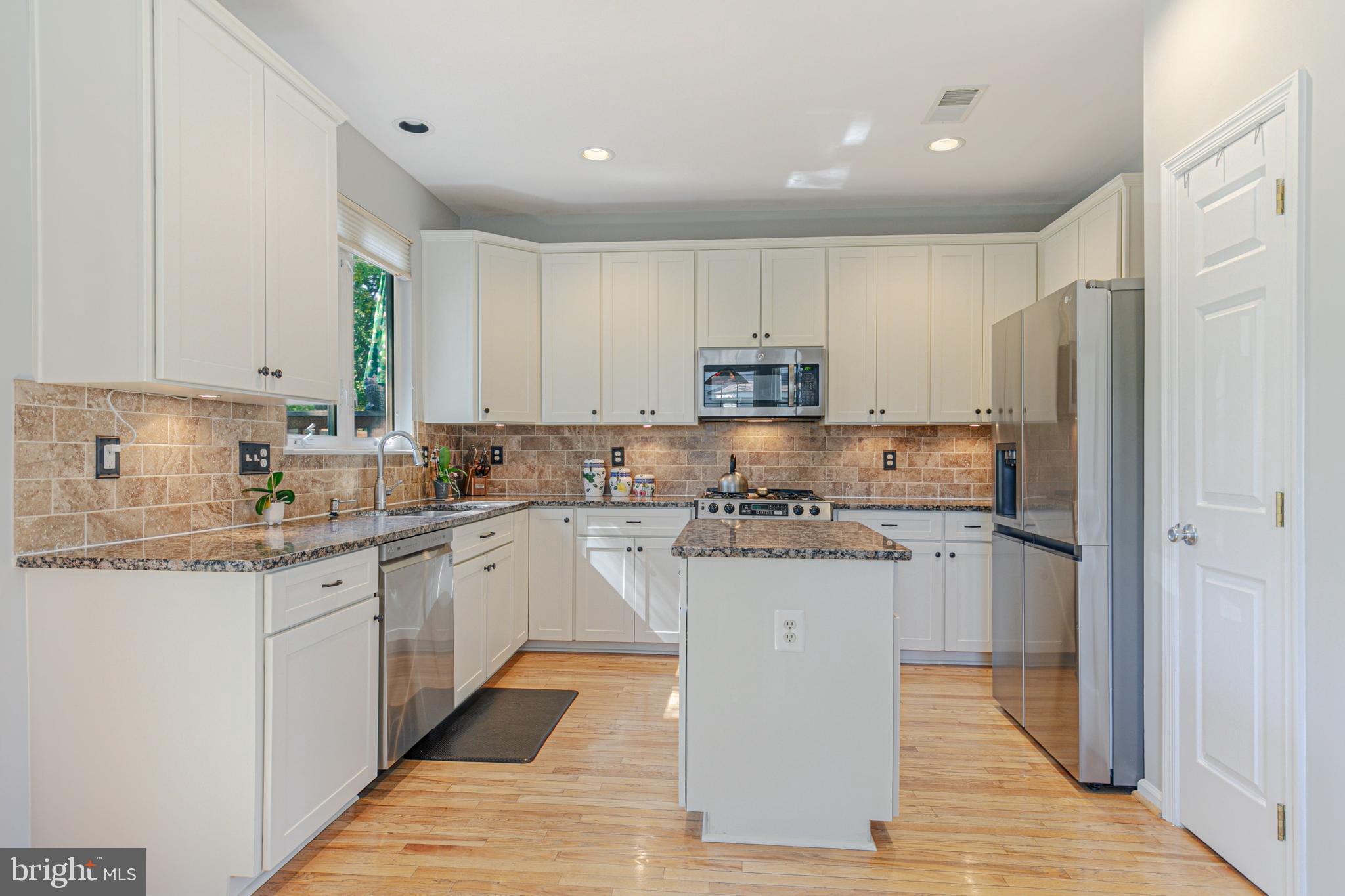 14813 Edman Road Centreville, VA 20121 - Photo 12 of 32 Gourmet Kitchen with Center Island and Gas Cooking