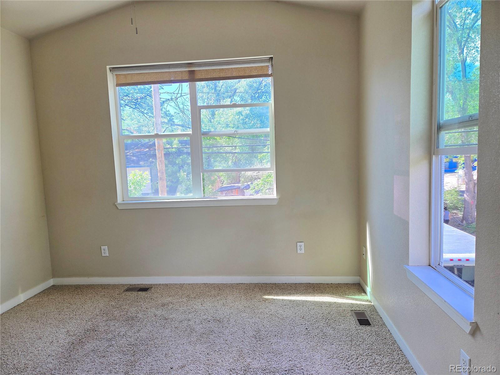 1902 Grove Street Boulder, CO 80302 - Photo 24 of 38 a view of an empty room with a window