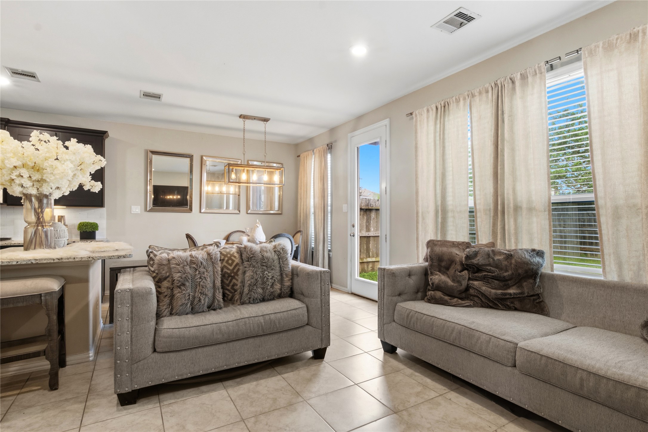 1815 Ryon Falls Drive Richmond, TX 77469 - Photo 5 of 24 a living room with furniture and a large window