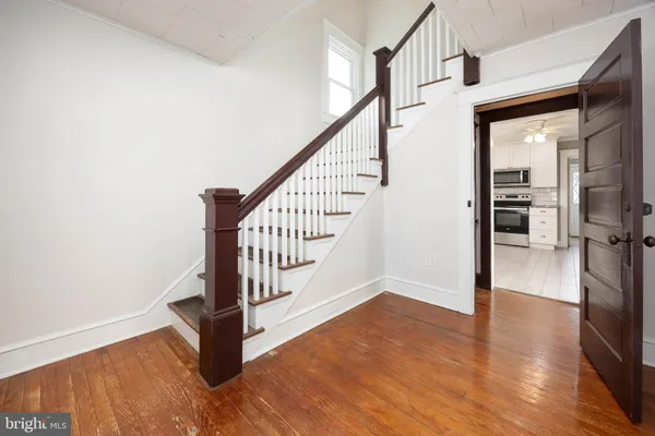 a view of a kitchen with a refrigerator a sink dishwasher and a refrigerator
