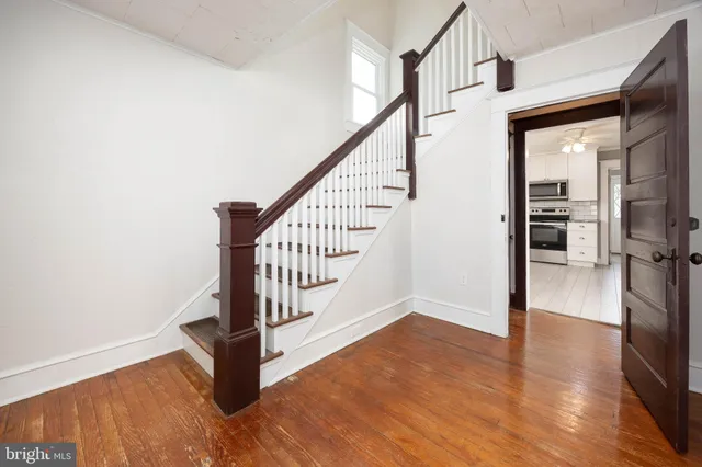 a view of a kitchen with a refrigerator a sink dishwasher and a refrigerator