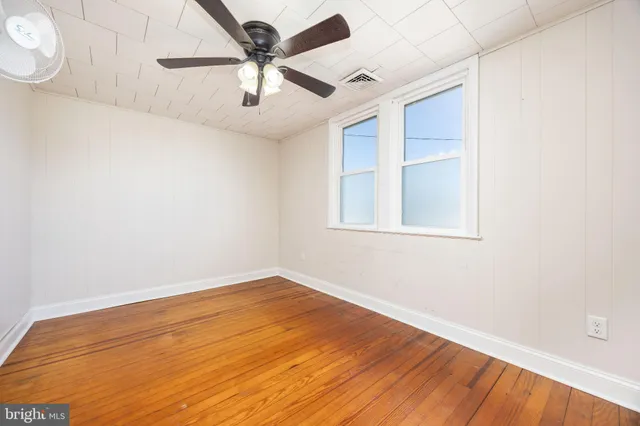 a view of a backyard of the house