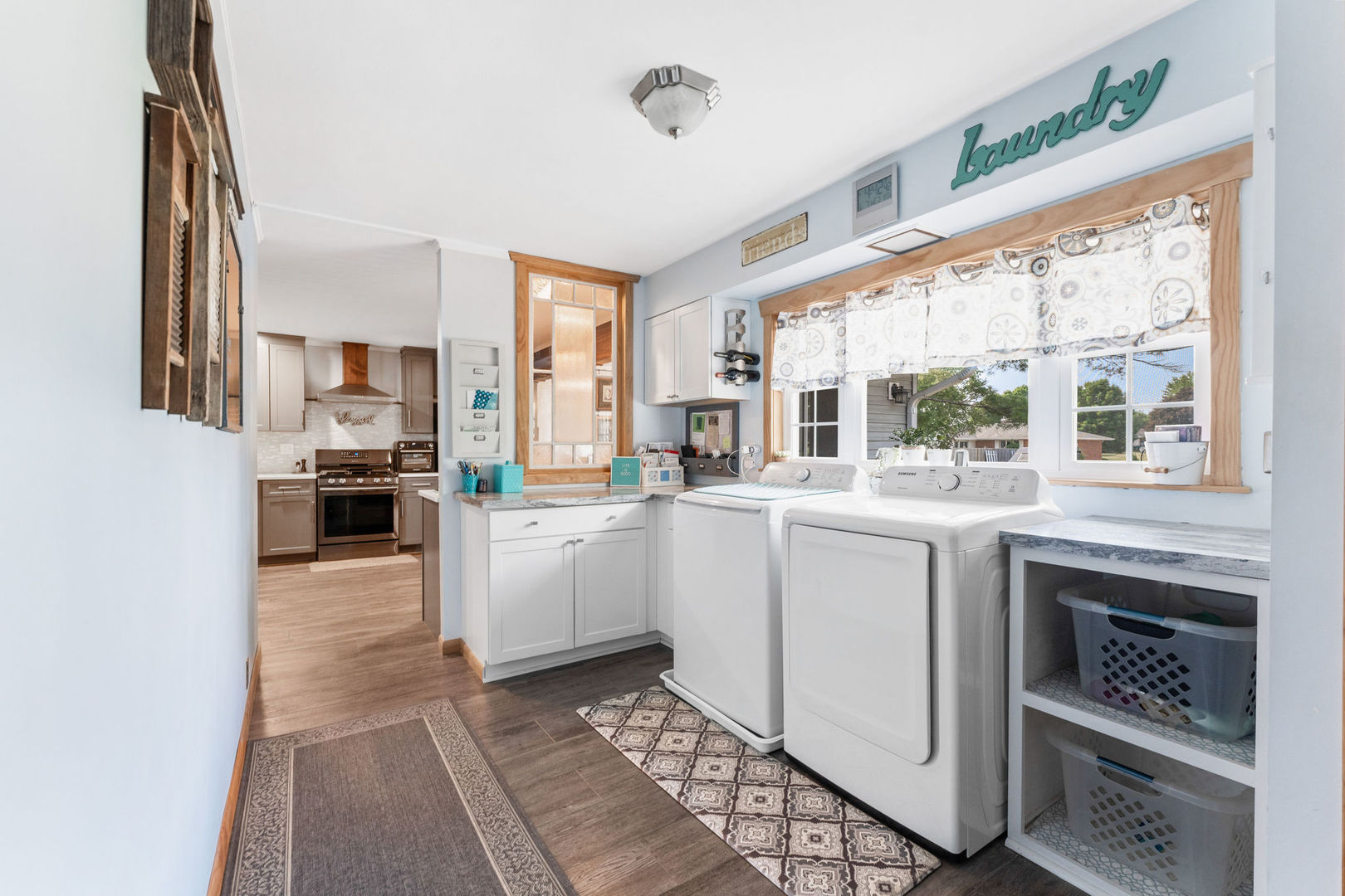 533 Bethany Road Sycamore, IL 60178 - Photo 13 of 38 a kitchen with white cabinets and appliances