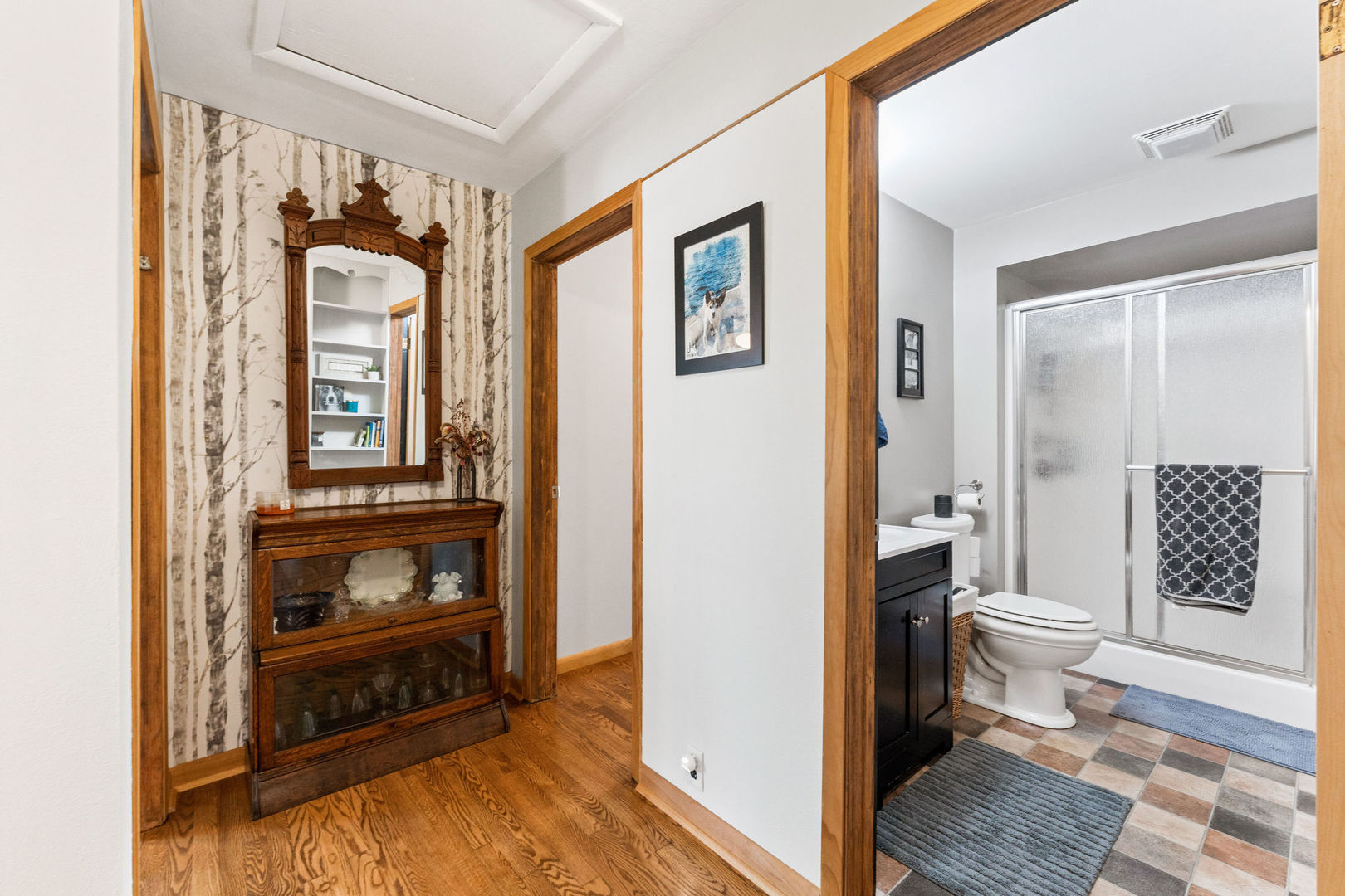 533 Bethany Road Sycamore, IL 60178 - Photo 14 of 38 a view of a hallway and a livingroom with furniture and windows