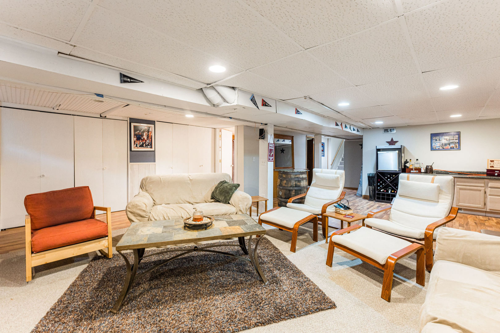 533 Bethany Road Sycamore, IL 60178 - Photo 25 of 38 a living room with furniture and a rug