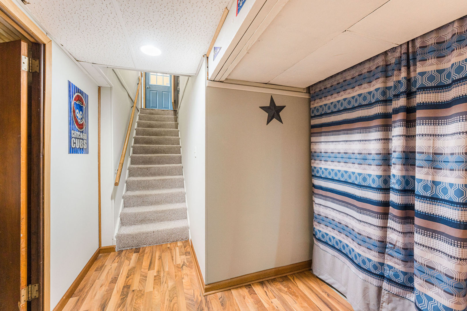 533 Bethany Road Sycamore, IL 60178 - Photo 30 of 38 a view of bedroom with wooden floor and stairs
