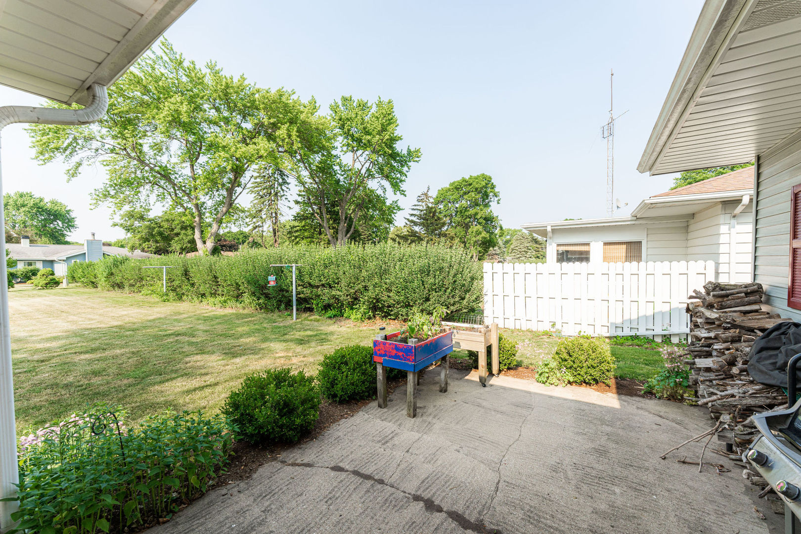 533 Bethany Road Sycamore, IL 60178 - Photo 32 of 38 a garden with trees in front of it