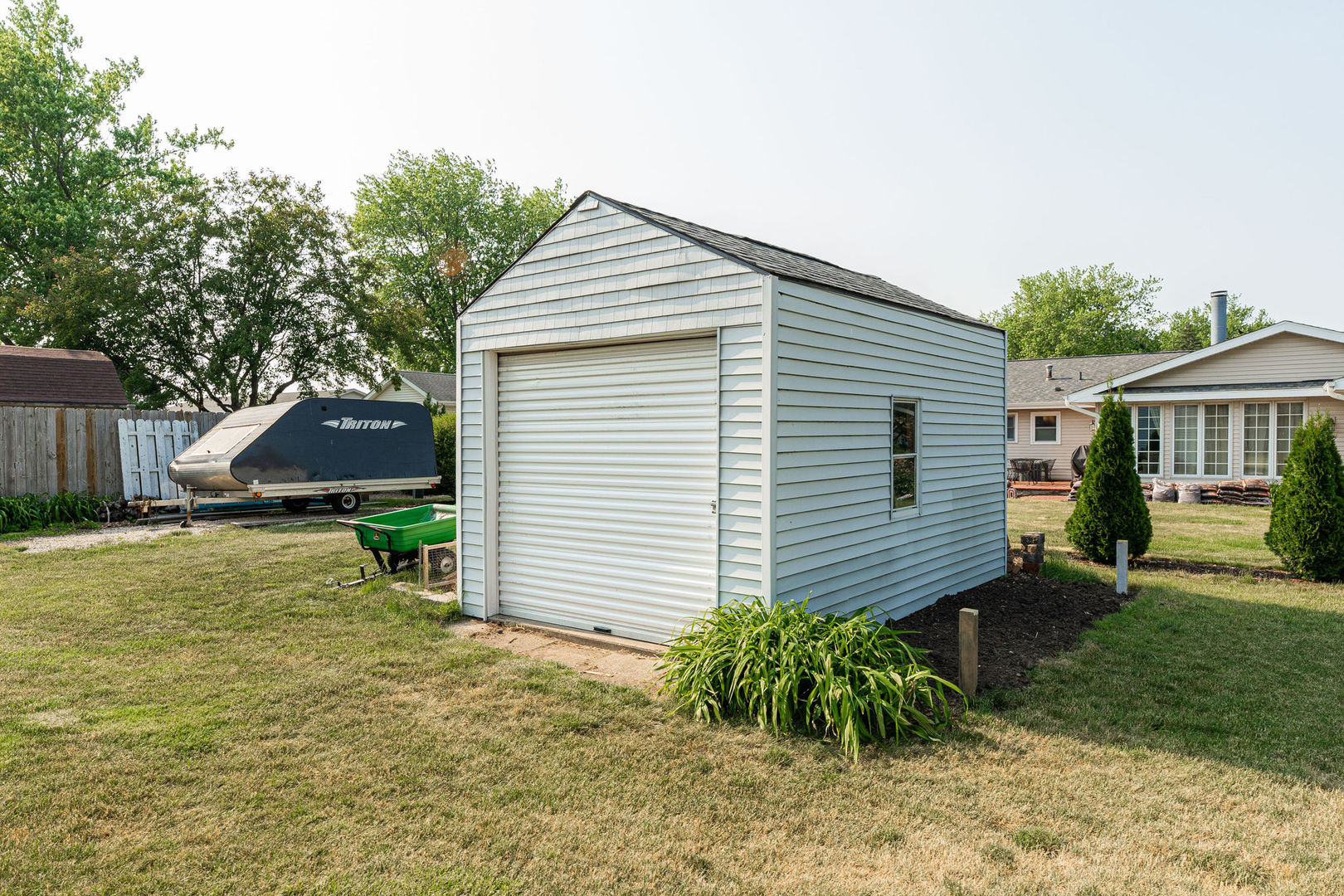 533 Bethany Road Sycamore, IL 60178 - Photo 36 of 38 a view of a house with a yard