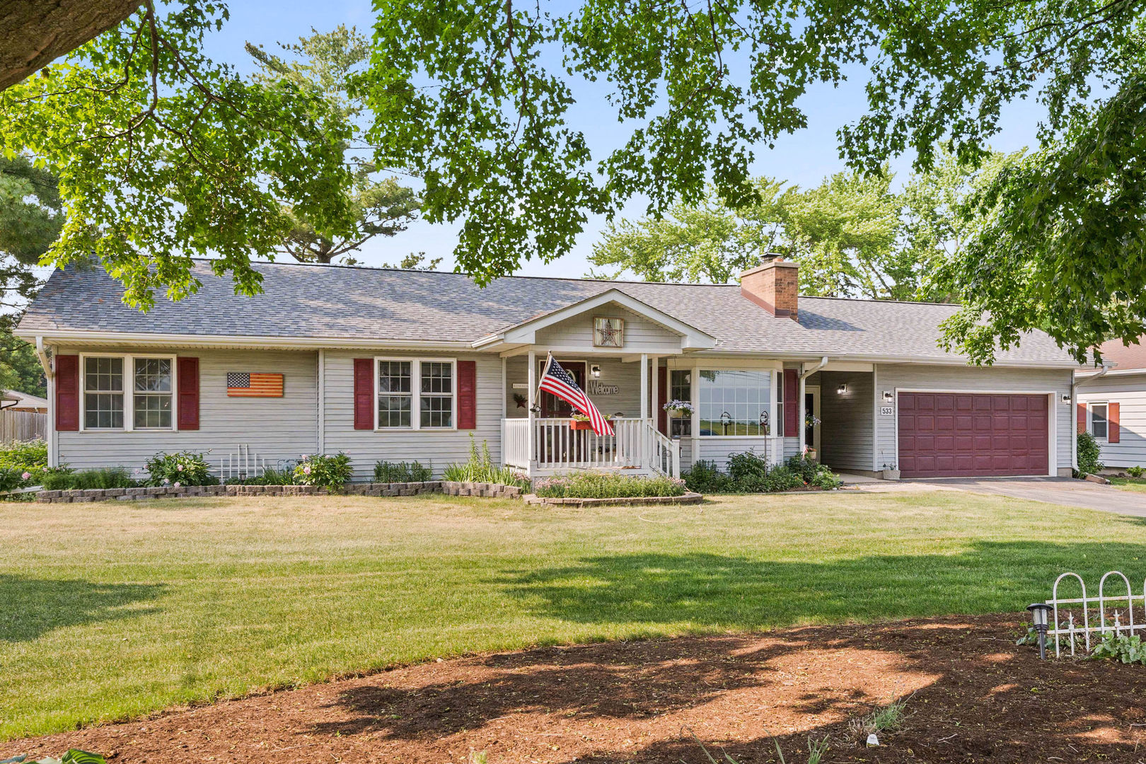 533 Bethany Road Sycamore, IL 60178 - Photo 38 of 38 a front view of a house with a yard