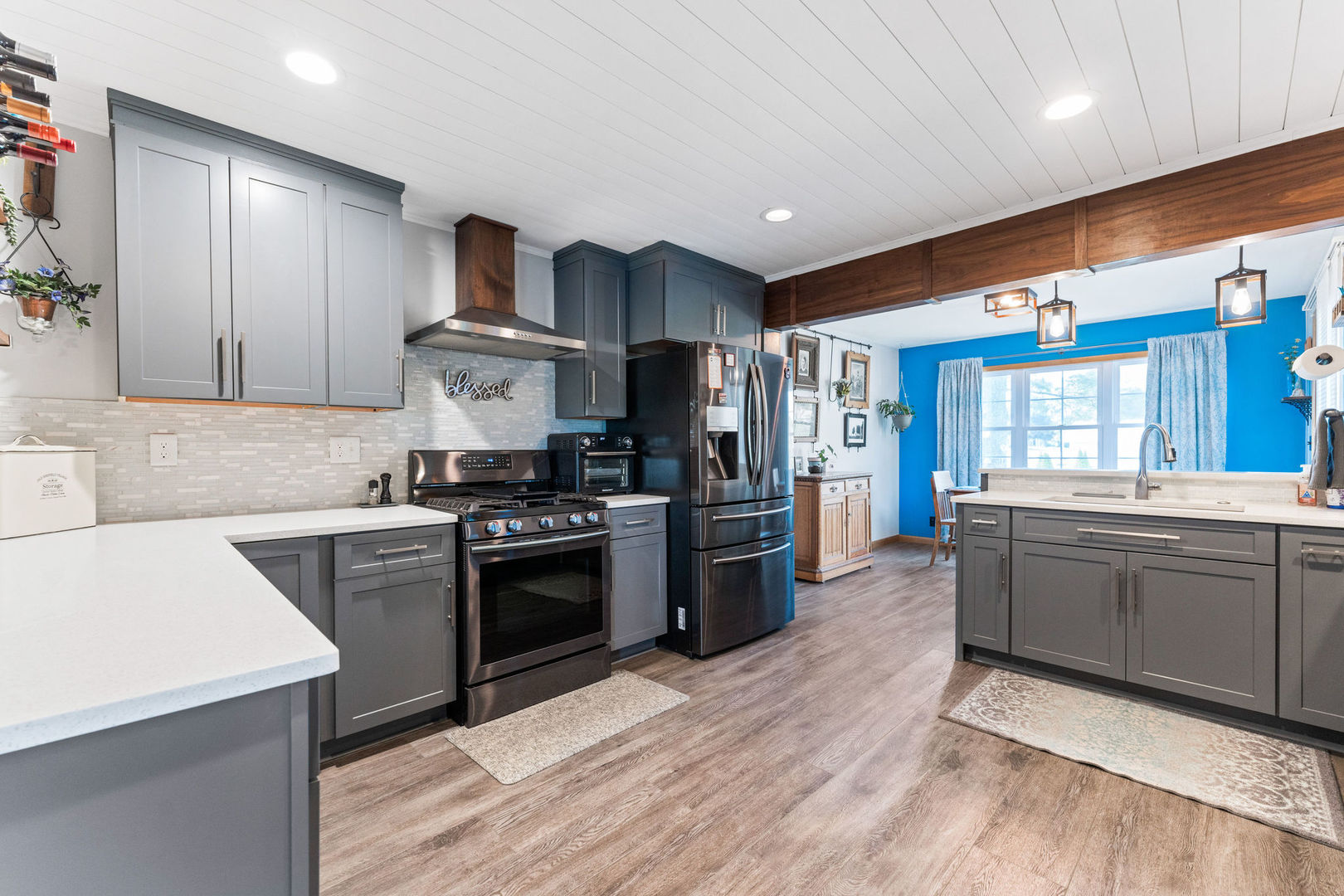 533 Bethany Road Sycamore, IL 60178 - Photo 6 of 38 a kitchen with granite countertop a sink stove and refrigerator