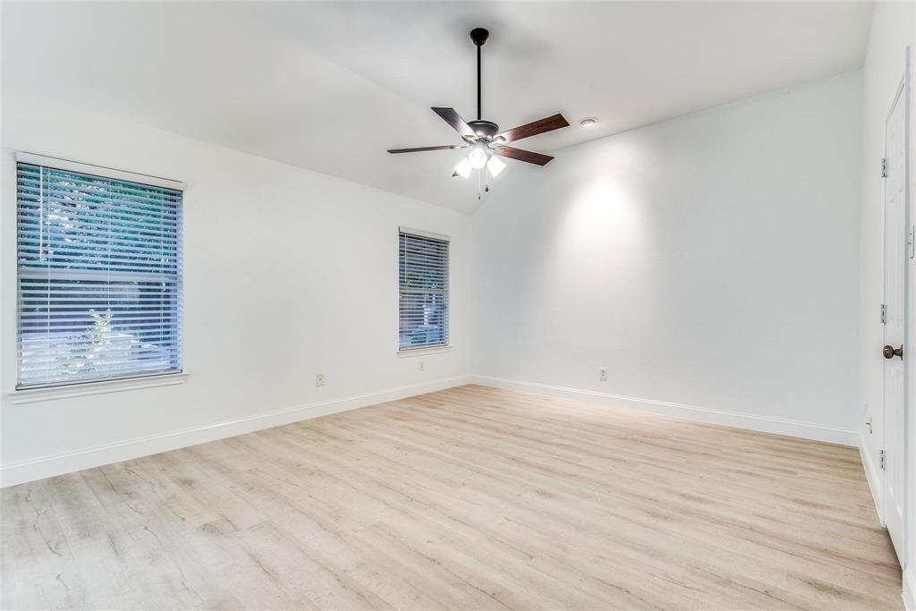 2504 Whetstone Drive Corinth, TX 76210 - Photo 11 of 19 a view of an empty room with a window