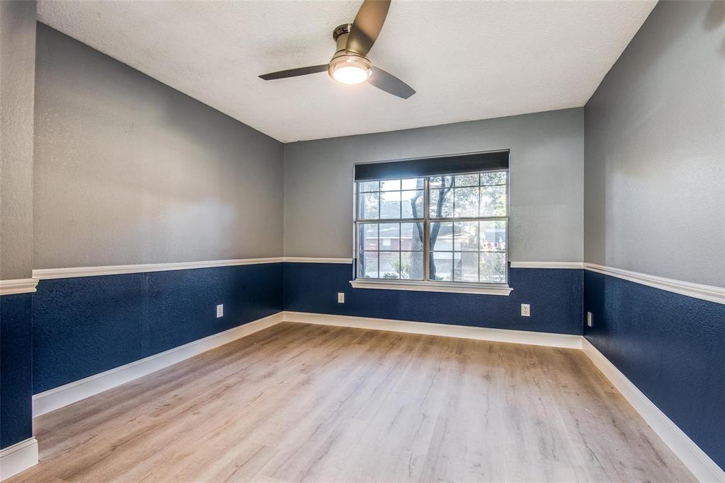 2504 Whetstone Drive Corinth, TX 76210 - Photo 14 of 19 an empty room with windows and fan