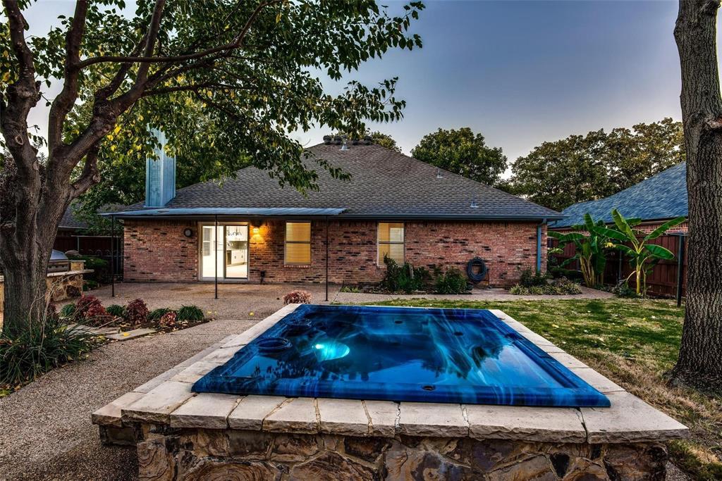 2504 Whetstone Drive Corinth, TX 76210 - Photo 17 of 19 a view of swimming pool and trees in the backyard