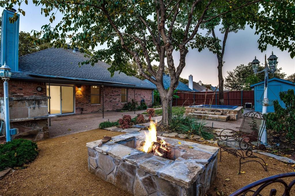 2504 Whetstone Drive Corinth, TX 76210 - Photo 19 of 19 a view of backyard with seating area and green space