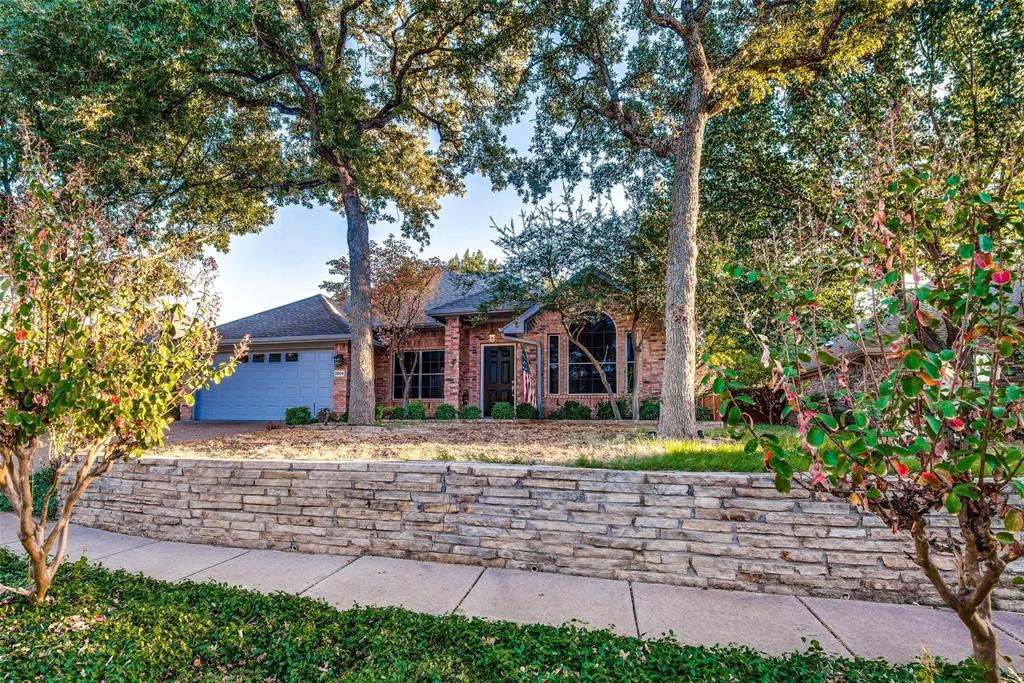 2504 Whetstone Drive Corinth, TX 76210 - Photo 2 of 19 a front view of a house with a yard