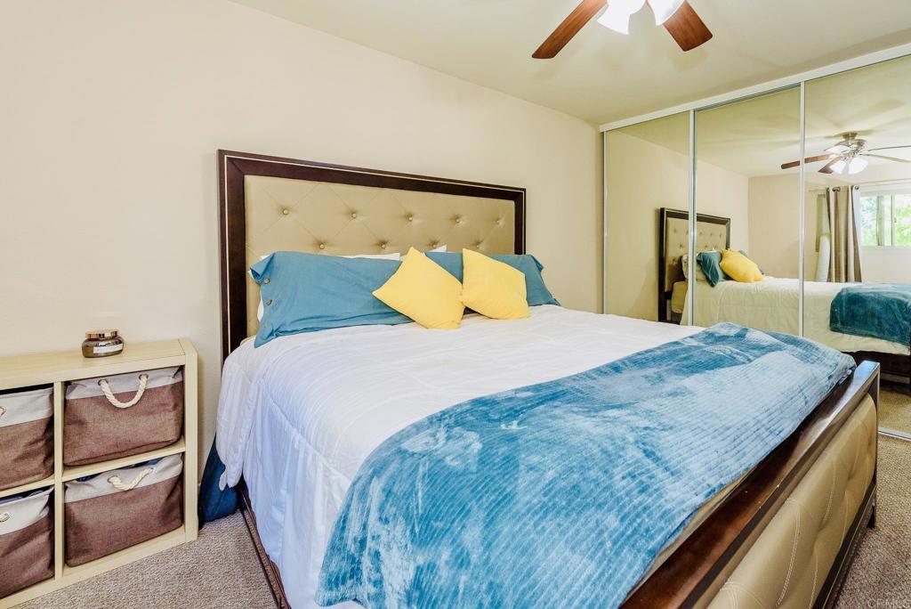 391 Emerald Avenue, Unit 12 El Cajon, CA 92020 - Photo 10 of 15 a bedroom with a bed and a dresser