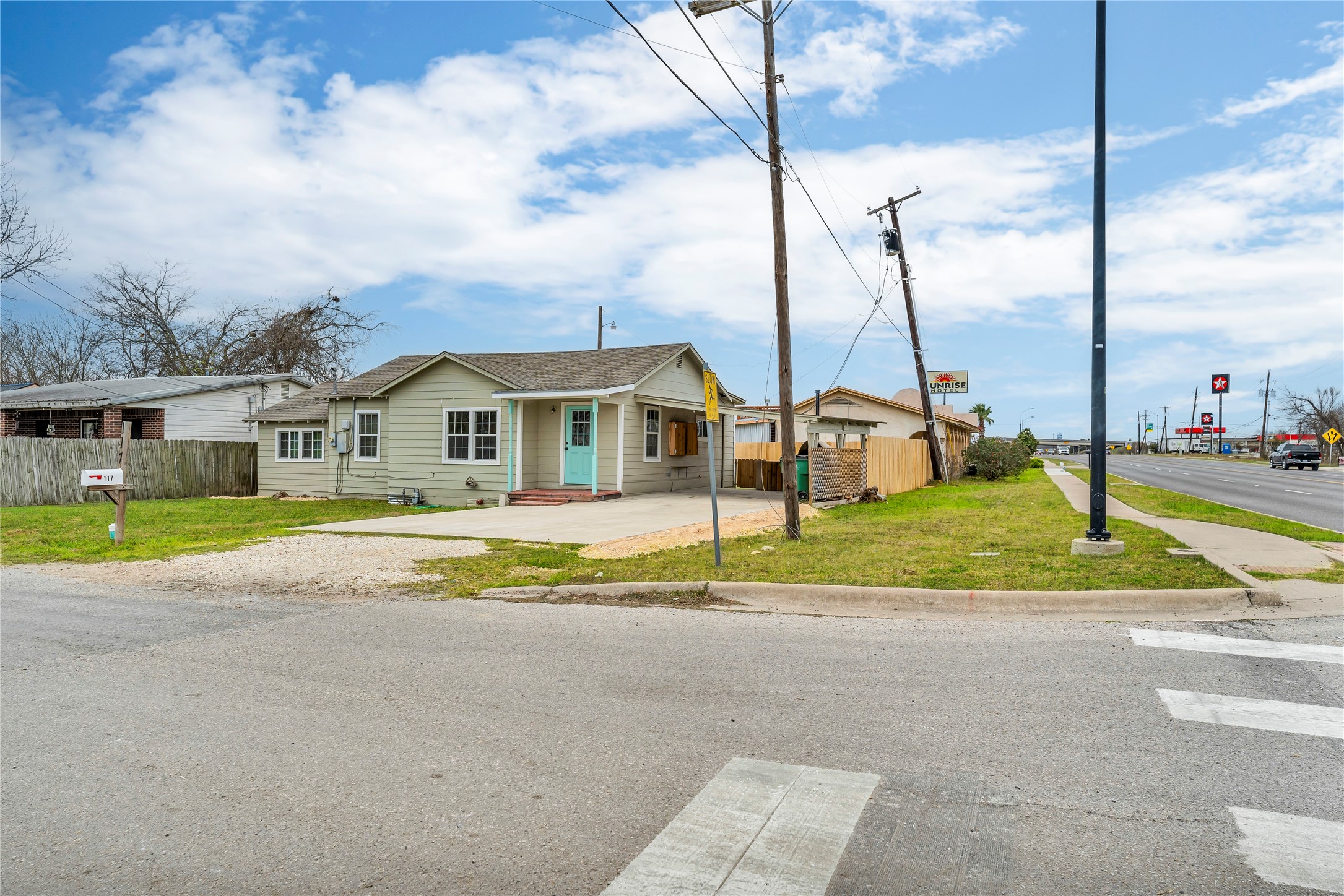 a view of houses with yard