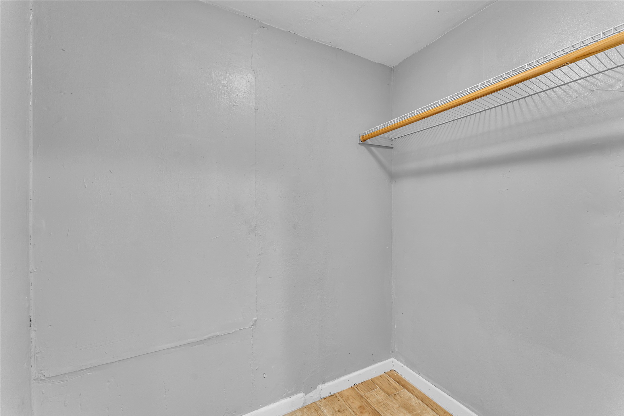 117 Travis Street Taylor, TX 76574 - Photo 14 of 23 a view of small space with racks on the wall