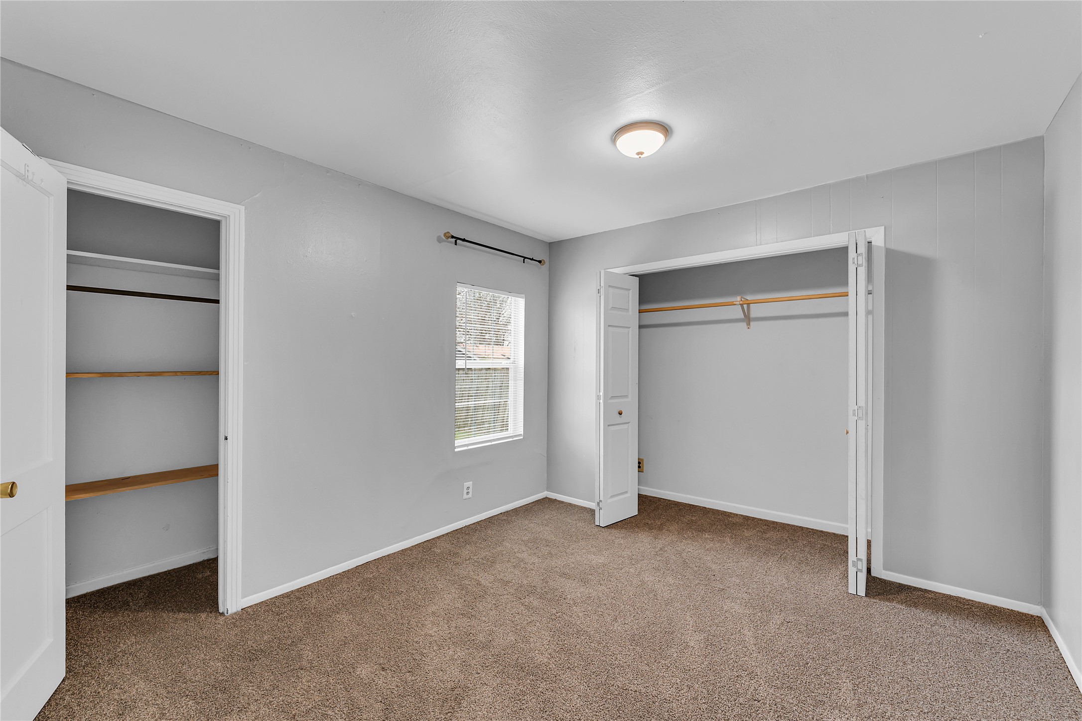 117 Travis Street Taylor, TX 76574 - Photo 17 of 23 a view of an empty room with a closet