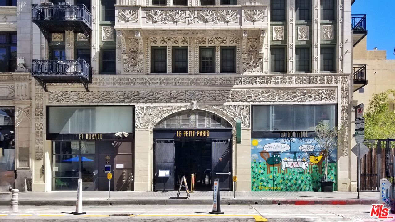 a view of a building with a entrance gate