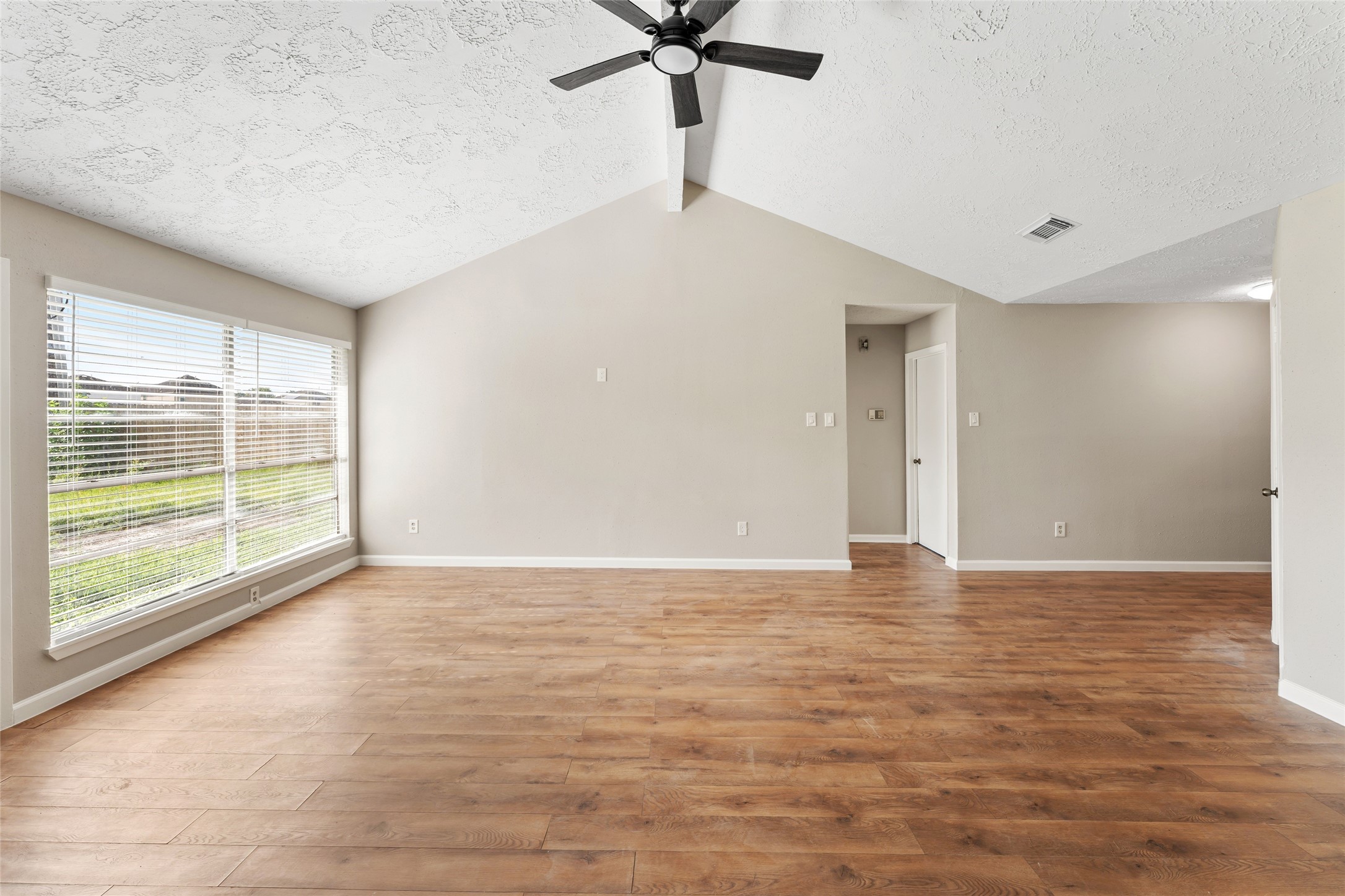 2327 Rittenmore Drive Missouri City, TX 77489 - Photo 4 of 16 Brightly lit family room.