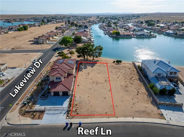 a view of a swimming pool with a lake view