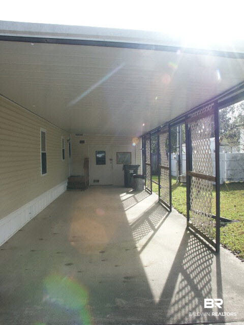 1371 Caney Loop Lillian, AL 36549 - Photo 14 of 20 Carport & Storage