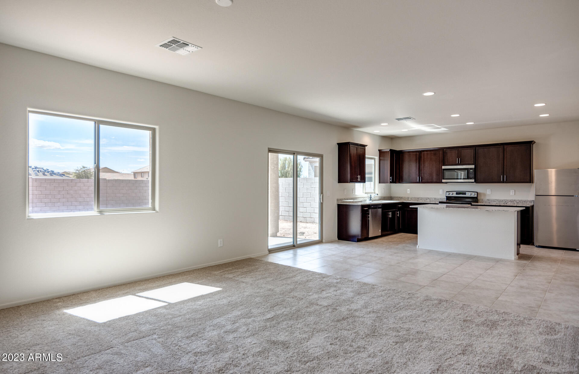 25307 West Romley Road Buckeye, AZ 85326 - Photo 13 of 25 Gathering Room/Kitchen