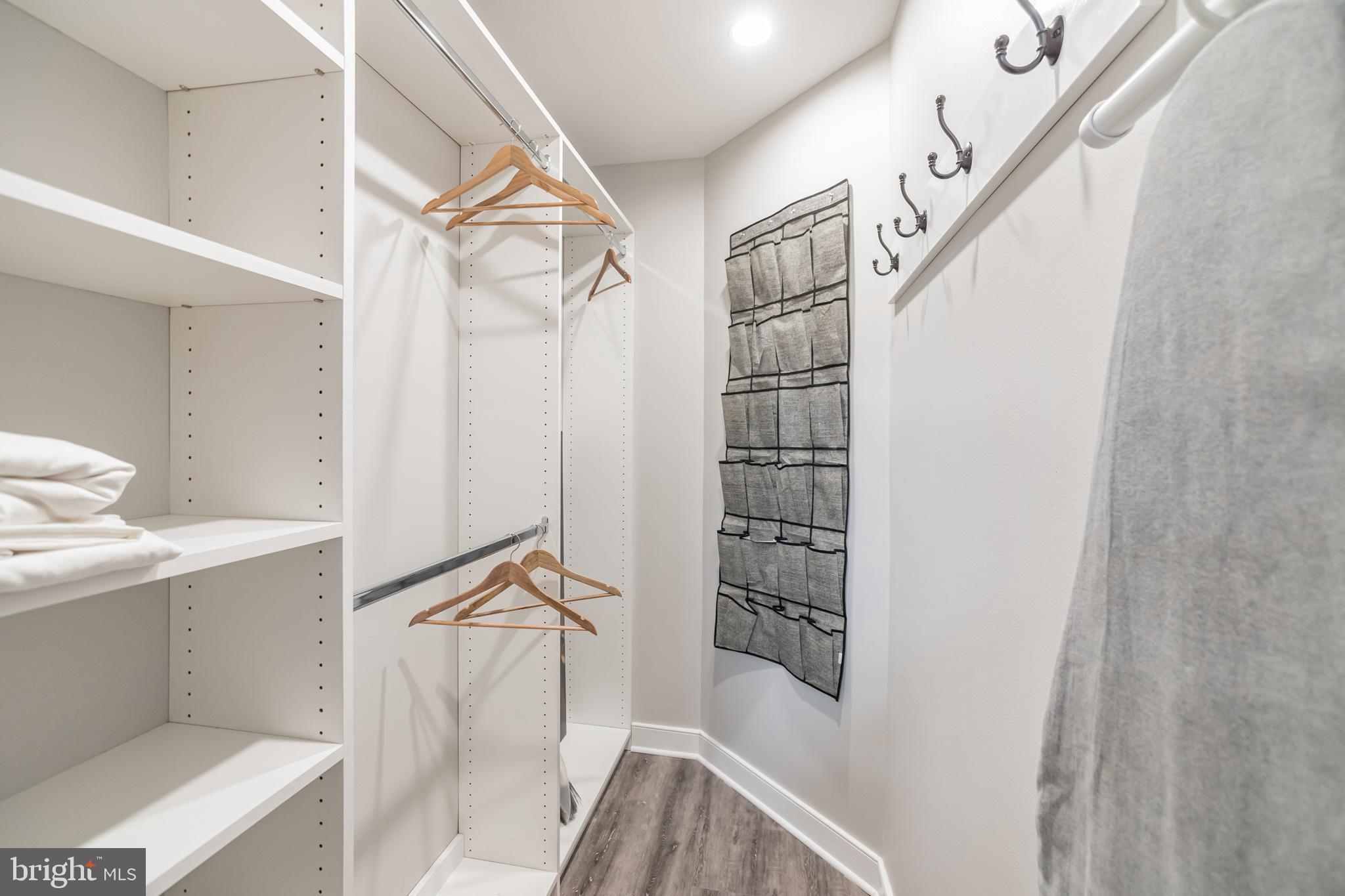 1238 Callowhill Street, Unit 101 Philadelphia, PA 19123 - Photo 11 of 17 a view of walk in closet with empty racks
